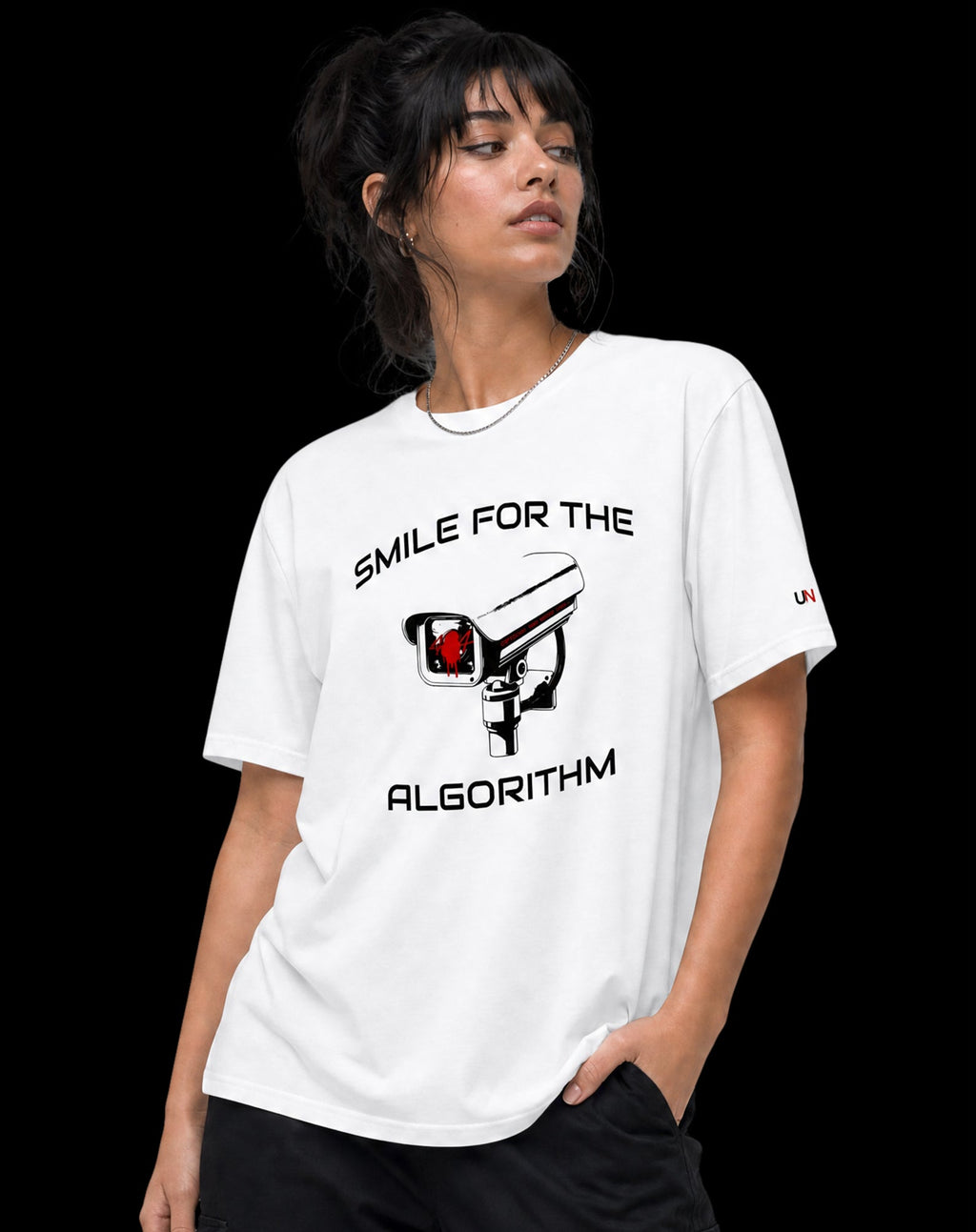 SMILE FOR THE ALGORITHM tee design detail — red surveillance camera graphic