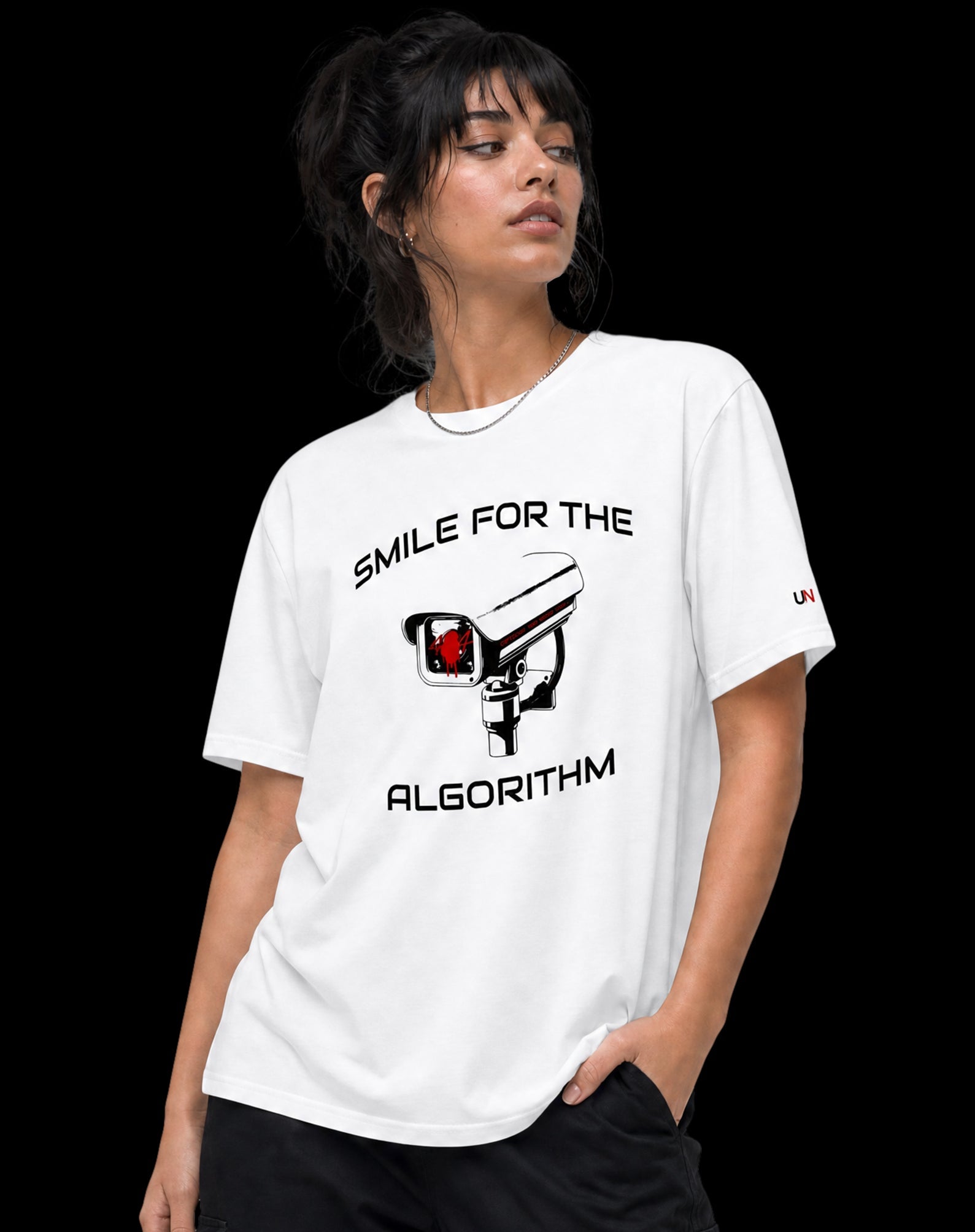 SMILE FOR THE ALGORITHM tee design detail — red surveillance camera graphic