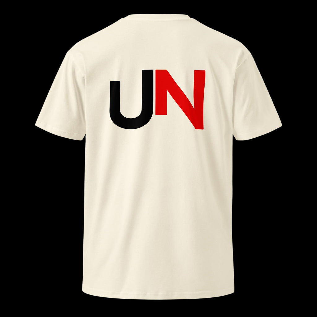 UNPROMPTED_ Core Identity Tee in natural — back view with UN stamp